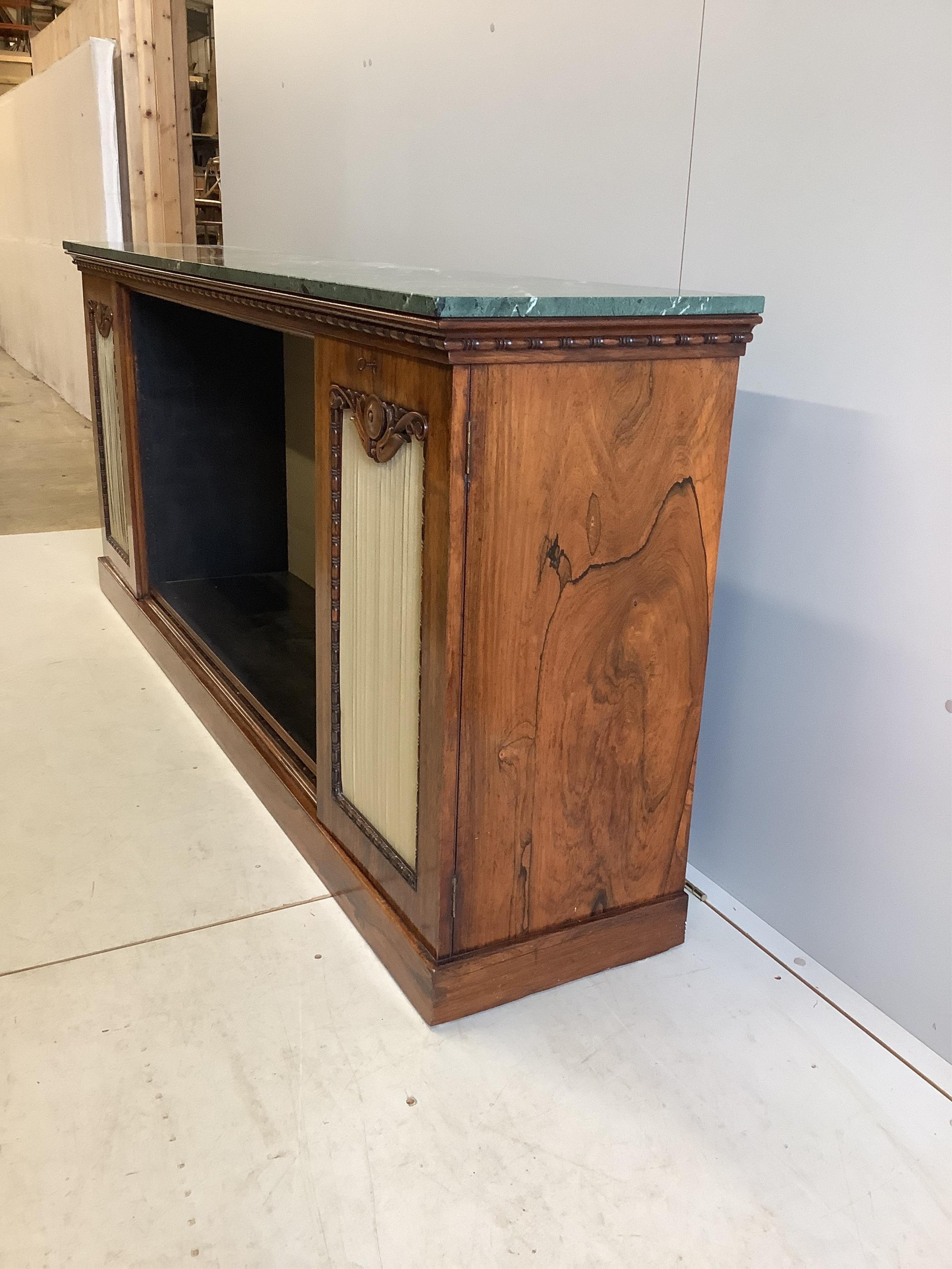 A William IV rosewood dwarf bookcase with associated marble top, width 213cm, depth 43cm, height 91cm. Condition - good